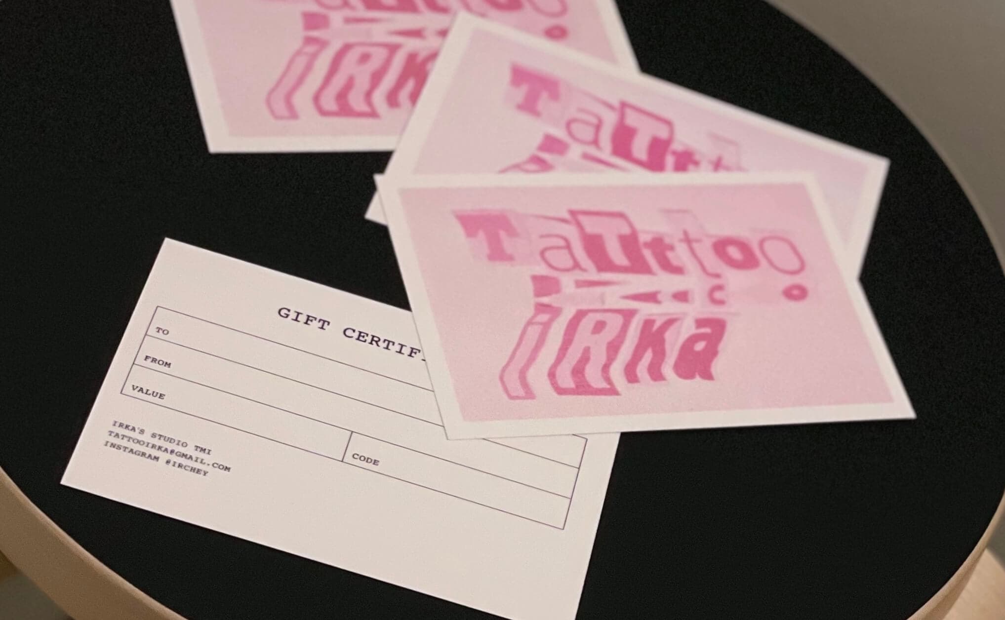 Close-up of a fine line tattoo by Irka