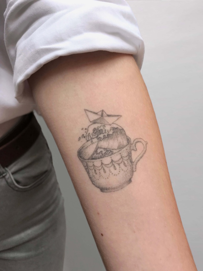 Art-inspired fine line tattoo by Irka in Helsinki