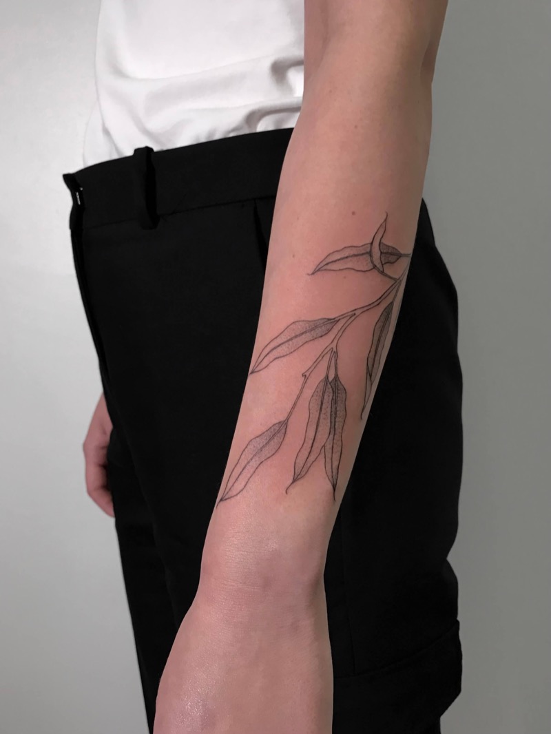 Fine line floral tattoo by Irka in Helsinki