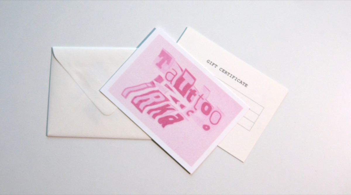 Close-up of a fine line tattoo by Irka