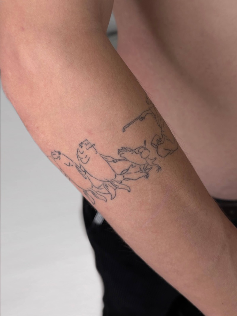 Healed Matisse-inspired dancing figures tattoo on forearm by Irka in Helsinki