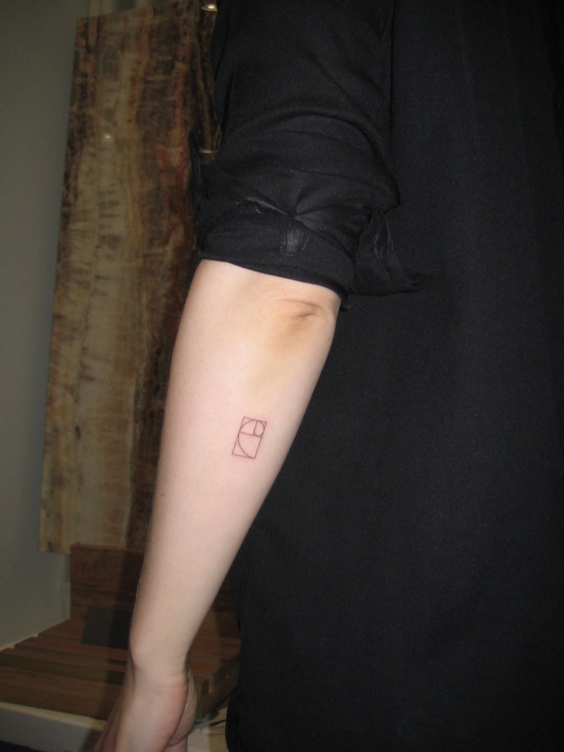 Minimalist golden ratio rectangle tattoo on forearm by Irka in Helsinki